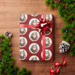Old World Santa Wrapping Paper<br><div class="desc">This Christmas wrapping paper features an old world Santa standing in front of two clock towers in a gold circular frame on a deep red background. Please note, I wasn't able to match up the the design along the seam, so there will be a portion of the wrapping paper that...</div>