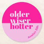 Older, Wiser, Hotter Minimal Bold Pink Birthday Round Paper Coaster<br><div class="desc">Celebrate in style and add a touch of sophistication to your adult birthday party with our "Older, Wiser, Hotter" adult birthday coasters. These beautifully designed paper plates feature a minimalist, bold pink theme that exudes elegance and charm. The "Older, Wiser, Hotter" theme perfectly captures the essence of celebrating another year...</div>