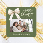 Olive green cream bow photo script Christmas Square Sticker<br><div class="desc">A muted olive green background,  cream coloured text and a bow. Merry Christmas is written with an elegant hand-lettered style font. Personalise and add your family name.</div>