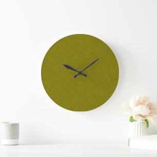Olive green surface with subtle swirling pattern large clock
