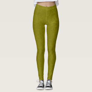 Olive green surface with subtle swirling pattern leggings