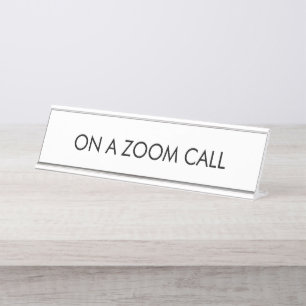 On a zoom call black white custom text minimalist desk name plate