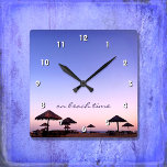 “On Beach Time” California Palapa Sunset Photo Square Wall Clock<br><div class="desc">“On beach time.” A purple blue and pink sunset on a Southern California beach with thatched palapas oozes relaxation and reflection. Relax, smell the ocean air, and recall memories of summer whenever you check the time on this chic, stylish, photography wall clock. Your choice of a round or square clock...</div>