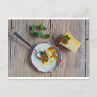 Onion pineapple chutney on rustic wood postcard