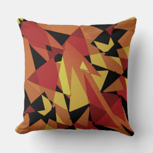 Opaque red and yellow triangles, spotty geometric cushion