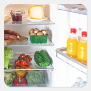 Open fridge filled with food square sticker