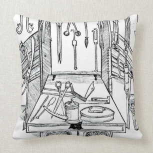 Operating table and surgical instruments, from 'Da Cushion