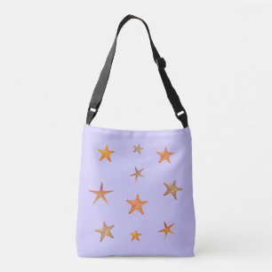Orange and beige sea stars on light blue crossbody bag