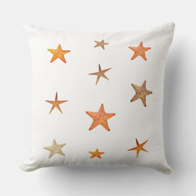 Orange and beige sea stars on white cushion (Front)