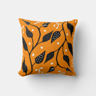 Orange and black whimsical vine cushion
