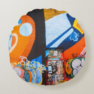 Orange and blue graffiti round cushion