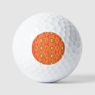 Orange and green pattern golf balls