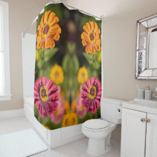 Orange and pink zinnias in blossom shower curtain