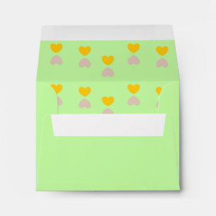 Orange and purple hearts on green envelope