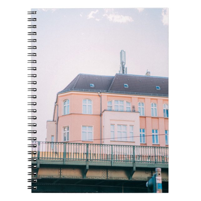 ORANGE AND WHITE CONCRETE BUILDING NOTEBOOK (Front)