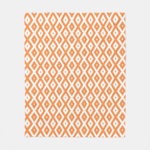 Orange and white diamond pattern fleece blanket