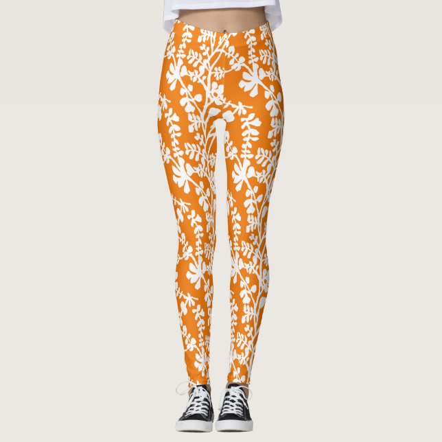 Orange And White Floral Repeating Pattern Leggings (Front)