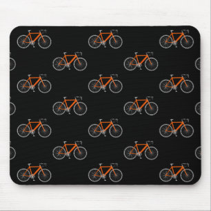 orange bicycle on black mouse pad