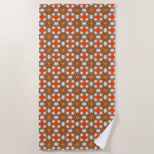 Orange, blue and white geometric patterned beach towel