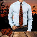 Orange Brown Sunset Novelty Striped Neck Tie<br><div class="desc">Check out this beautiful modern, chic tie on a flamed Orange Brown sunset background with Orange and Black stripes. You can easily update the monogram. The unique background of this tie was painted by hand digitally. This cool fun tie with black and orange stripes and monogram will be a great...</div>