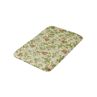 Orange Butterfly on Delicate White Flowers Bath Mat