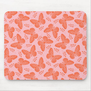 Orange butterfly pattern on pink background mouse pad
