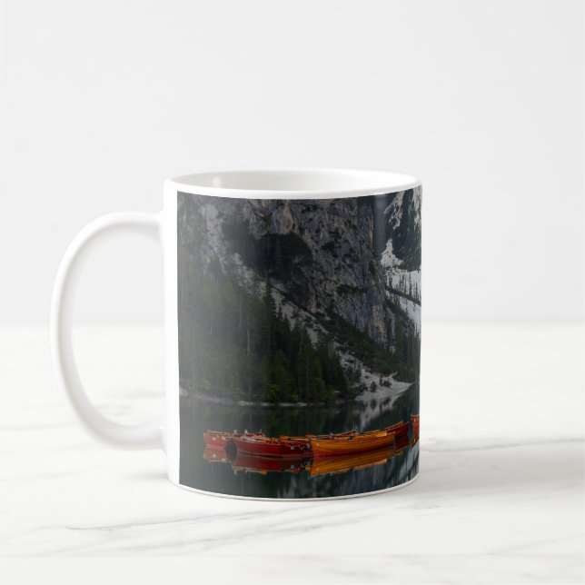 ORANGE CANOE ON BODY OF WATER COFFEE MUG (Left)