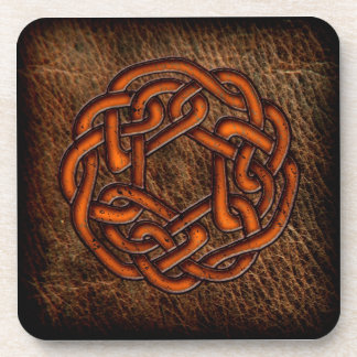 Orange celtic knot on leather coaster