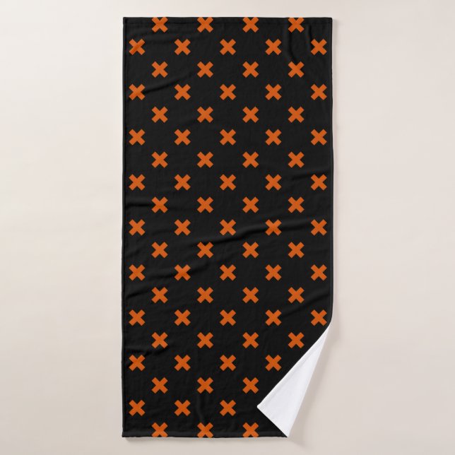 Orange cross stitches on black bath towel (Bath Towel)