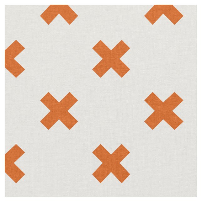 Orange cross stitches on white fabric (Close Up)