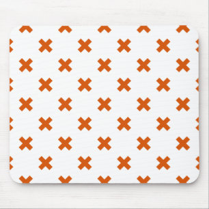 Orange cross stitches on white mouse pad