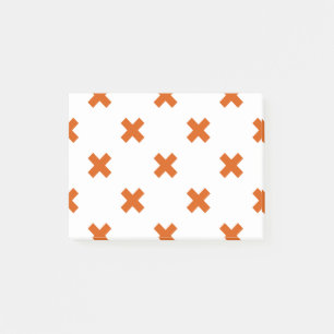 Orange cross stitches on white post-it notes