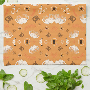 Orange fabric pattern with white sheep tea towel