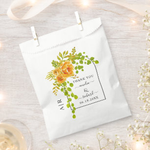 Orange flowers, arch and monogram fall wedding favour bags