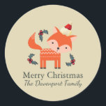 Orange Fox In Santa Hat Cute Whimsical Christmas Classic Round Sticker<br><div class="desc">A charming christmas sticker with a retro flair. An illustration of a cute orange fox,  wearing a red santa hat surrounded by christmas holly decorations. A sweet little festive forest animal. Set on a neutral tone tan colour background . Text says Merry Christmas,  with your personalised name.</div>