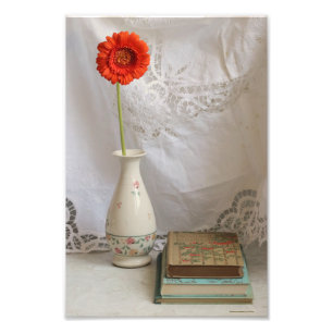 Orange gerbera and books photo print