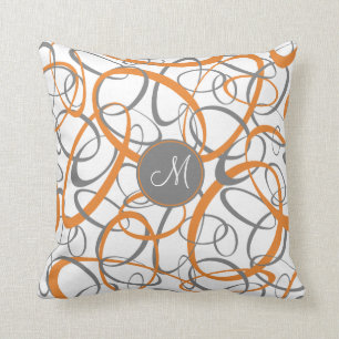 orange grey loops on white geometric pattern cushion