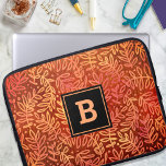 Orange leaf pattern monogram modern bold botanical laptop sleeve<br><div class="desc">A sparkly gold and copper foil ombre autumn leaf pattern on a rich burnt orange and deep red textured background adorns this modern, trendy neoprene laptop sleeve. Customise this elegant sleeve with your monogram initial. Makes a chic and stylish statement every time you use it. This laptop sleeve comes in...</div>