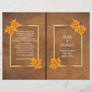 Orange maple leaves on brown wedding program