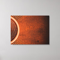 Orange music speaker and sound waves