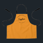 Orange Personalised Name Year Master Baker Apron<br><div class="desc">Let's get baking. Customise the Name and established year as you need on this kid's apron. This personalised apron on orange with white type. Stylish typography style treatment. Encourage the Master baker in your life with a special gift. Perfect for baking those holiday Christmas cookies, everyday desserts, treats and baked...</div>
