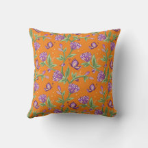 Orange pillow with floral purple butterflies