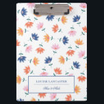 Orange Pink Blue Colourful Floral Pattern Clipboard<br><div class="desc">Pretty floral clipboard with a pattern of flowers in yellow,  orange,  blue,  and pink. Add your name or business name in elegant blue letters.</div>