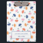 Orange Pink Blue Colourful Floral Pattern Clipboard<br><div class="desc">Pretty floral clipboard with a pattern of flowers in yellow,  orange,  blue,  and pink. Add your name or business name in elegant blue letters.</div>