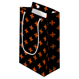 Orange polka crosses on black small gift bag