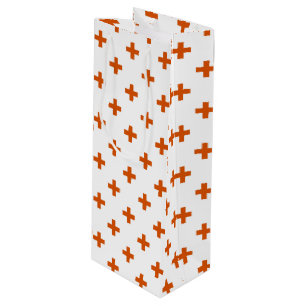 Orange polka crosses on white wine gift bag