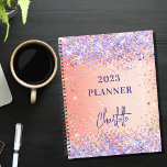 Orange rose gold violet purple glitter script 2023 planner<br><div class="desc">An orange and rose gold gradient background. Decorated with rose gold and violet,  lavender colored faux glitter sparkles. Personalize and add a title and a name. The name is written with a modern script,  signature look.</div>