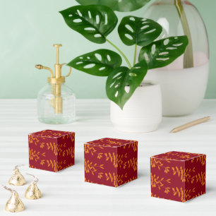 Orange silhouette branch leaves on red favour box