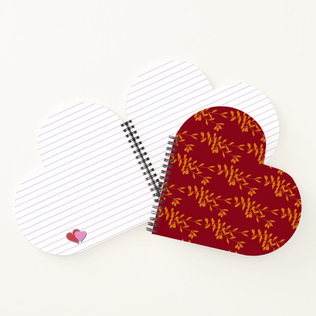Orange silhouette branch leaves on red notebook (Inside)