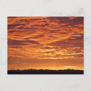 Orange Sky over Mountain Range. Postcard